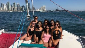 a group of women on a boat